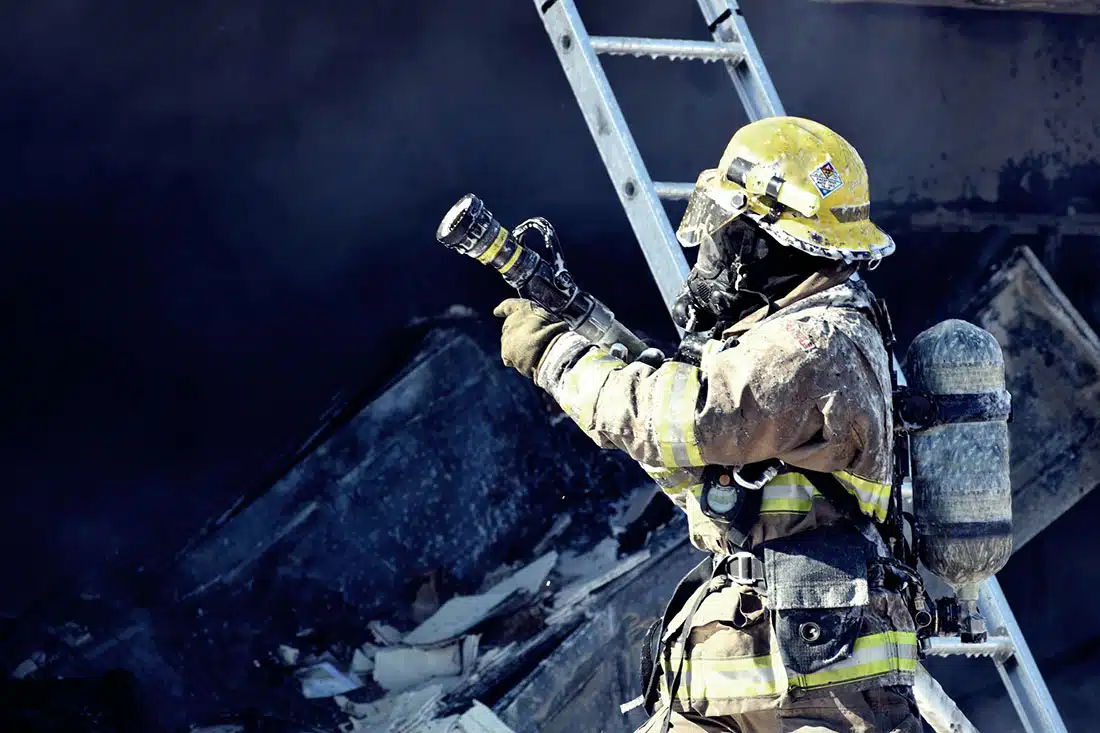 Fire fighters putting out a building fire
